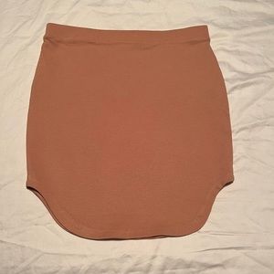 Peach colored bodycon mini skirt